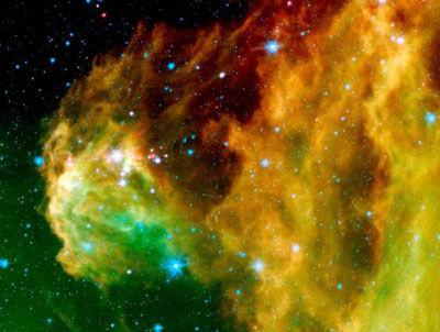 斯必泽(spitzer)太空望远镜拍摄的最新红外图象表明,幼年恒星是在猎户
